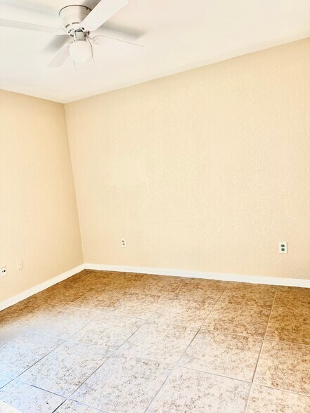 Spacious second bedroom ready for your personal touches - 6281 Hunters Ridge Dr