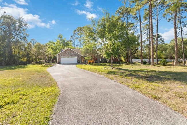 Building Photo - MOVE-IN SPECIAL - Beautiful 3/2 Home in Ba...