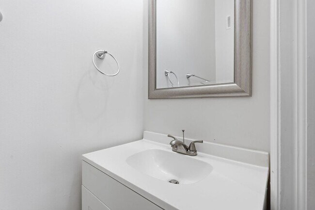 Building Photo - Experience contemporary living in this beautifully renovated residence where modern design meets ...