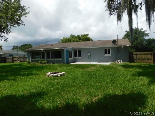 Building Photo - 1709 Umbrella Tree Dr