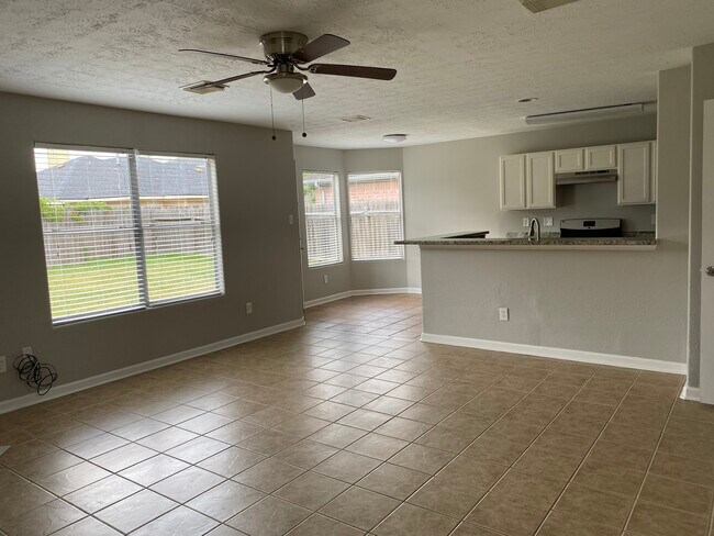 Spacious Living Room + Open Kitchen - 6319 Foxhunter Rd