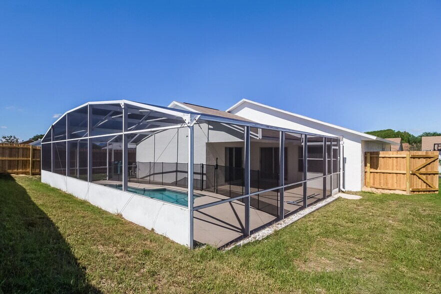 Building Photo - 8669 Wellington Loop