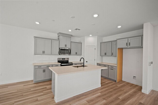 Building Photo - Modern Living in SOMO Village-Brand New 20...