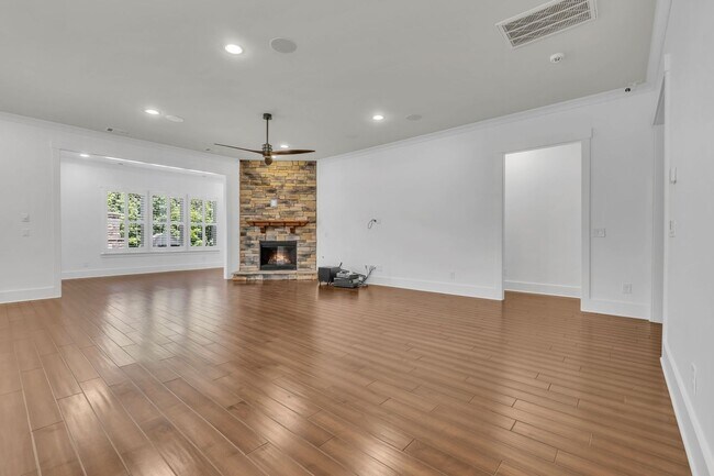 Building Photo - Beautifully maintained and move-in ready, this stunning mostly one-level all-brick home