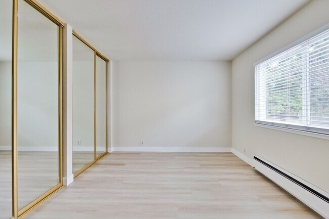 Building Photo - Refreshed 2/2 Second Floor Campbell Condominium in Great Location! Attached Garage & Additional S...