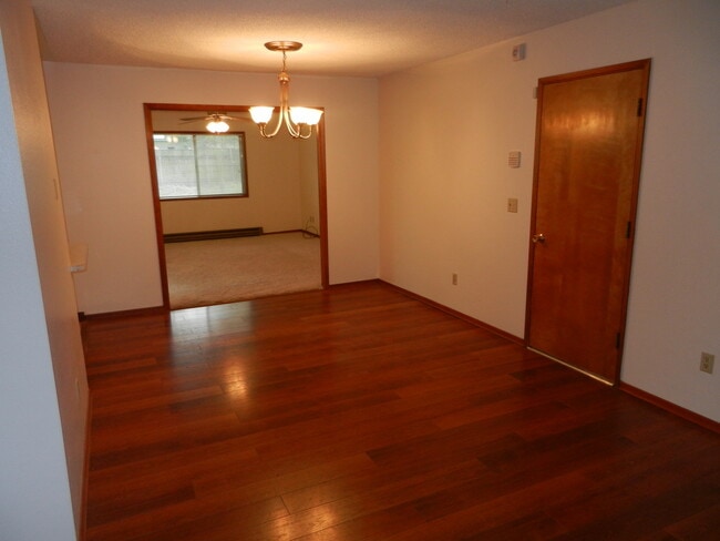 Building Photo - Well-Located Home with Fireplace, Fenced Yard & 2-Car Garage