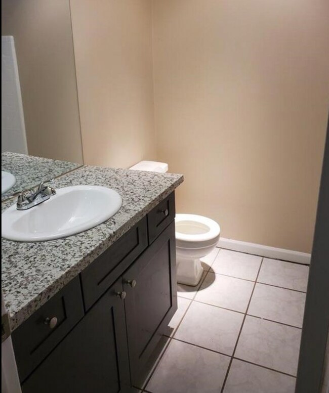 Bathroom 1 of 2 - 4410 McCleester Dr