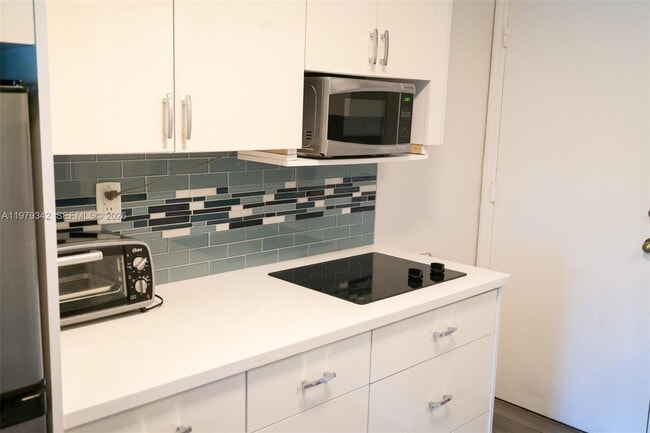 Building Photo - 16060 SW 144th Ave