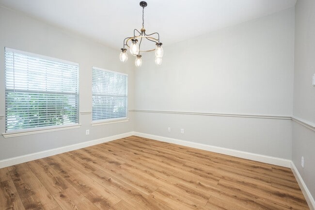 Building Photo - Exclusive 4 Bedroom • Lovely Backyard Spac...