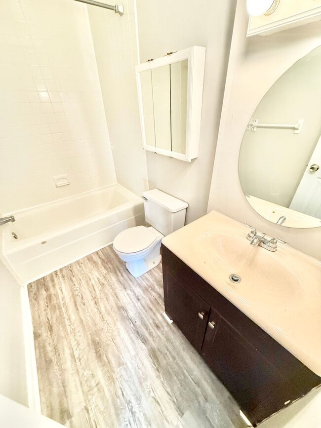 Building Photo - *** RENT READY!! Newly remodeled townhome! ALL Laminate.