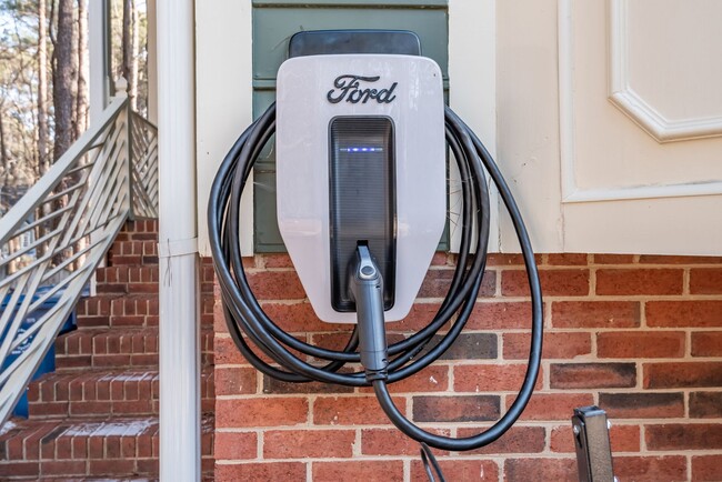 Building Photo - Wonderful in Woodcroft! Ford Electric Car ...