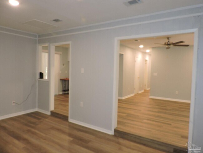Building Photo - 6970 Woodley Dr