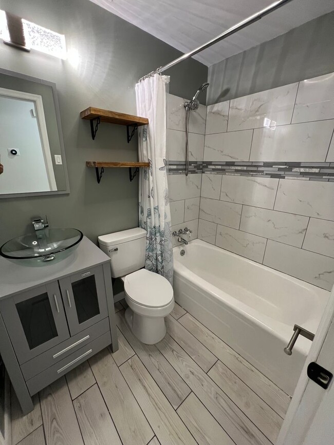 Building Photo - Updated 3BR | Solar Panels + Fenced Yard