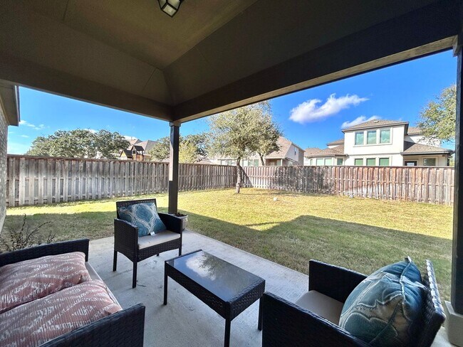 Building Photo - Inviting 4-Bed, 2.5-Bath Home with High Ceilings and Covered Deck