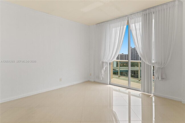 Building Photo - 19390 Collins Ave