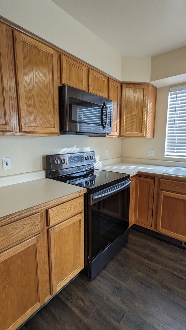 Building Photo - SPRINGS RANCH 3 BEDROOM/2 BATHROOM RANCH WITH FENCED YARD AND 2 CAR GARAGE!