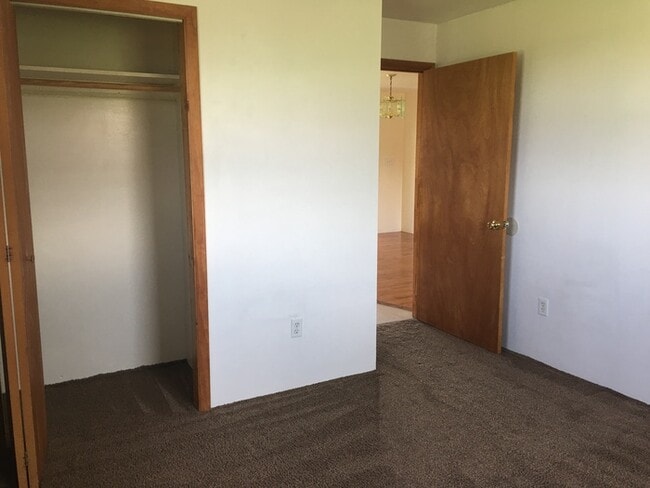 Building Photo - Beautiful secluded 4 bedroom 2.5 bath home with 2 stall detached garage and descent sized yard