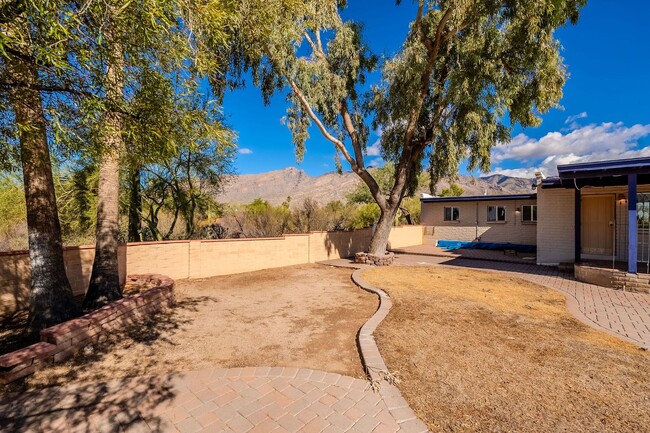 Building Photo - Hacienda-Style Gem with Pool – Spacious 3-...