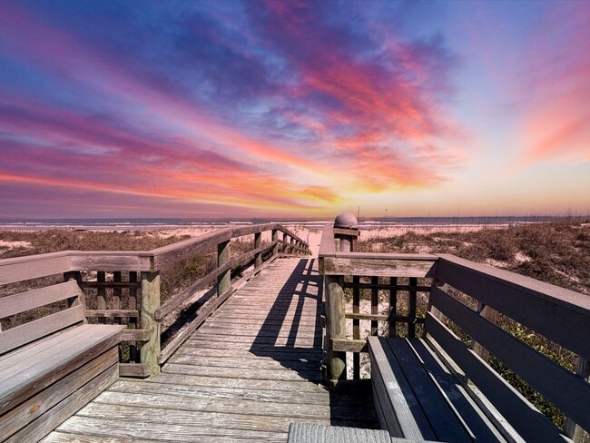 Building Photo - Beautifully Renovated, Fully Furnished Beach Condo just a short walk from the ocean.