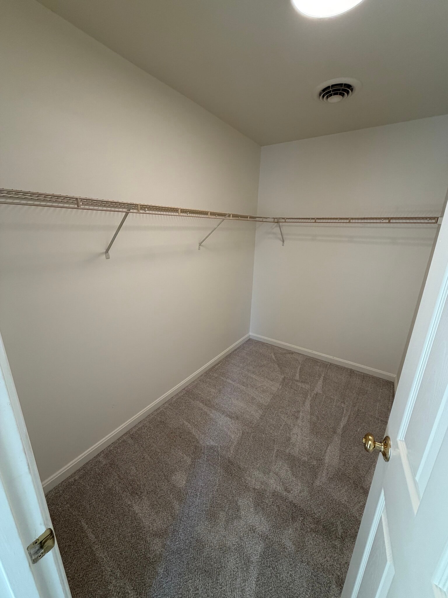 Primary bedroom offers large walk in closet - 903 Harwood Rd