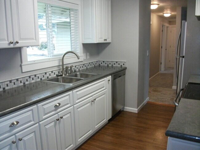 Building Photo - Inviting 3-Bedroom Home with Workshop/Storage and Outdoor Space