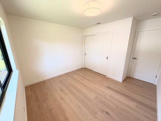 Building Photo - This premier 4-bed, 3-bath estate spans 2,565 sq. ft. on a 10,253 sq. ft. lot in North Los Altos.