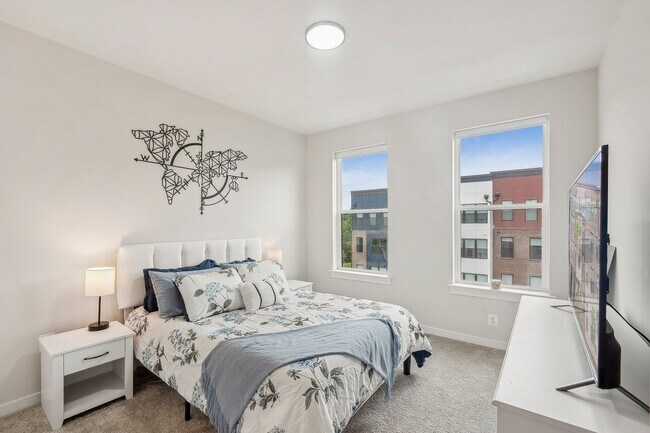 Building Photo - The Julianne is modern, functional, and full of charm—don’t let it get away!