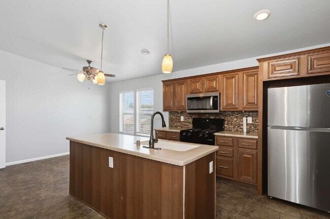 Building Photo - "Spacious 4-Bedroom Oasis with 2 Full Baths on Mount Rainier Ave, Las Vegas – Your Perfect Retrea...