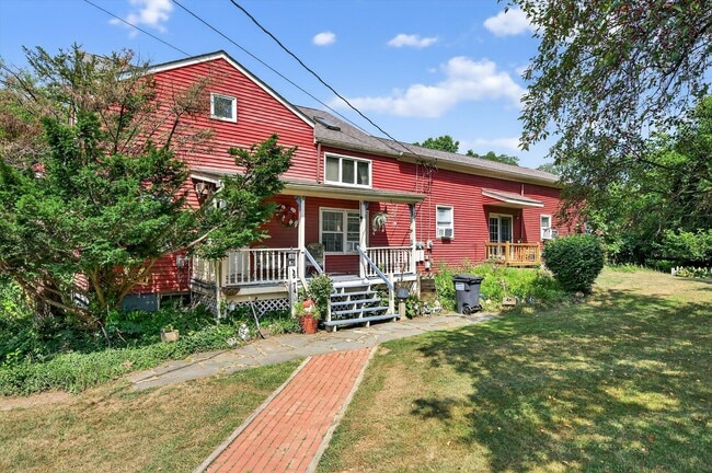 Building Photo - Price Reduction: Charming 3BR Farmhouse Re...