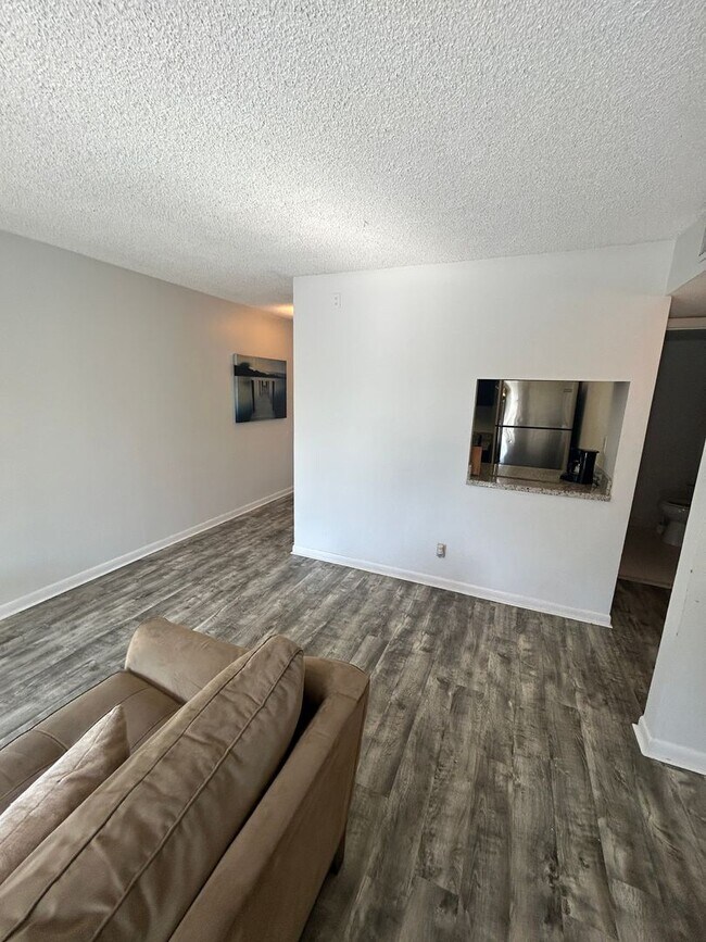 Building Photo - Now Leasing: 1-bedroom and 1.5 bath condo ...