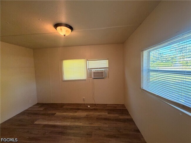 Building Photo - 8385 Nault Rd