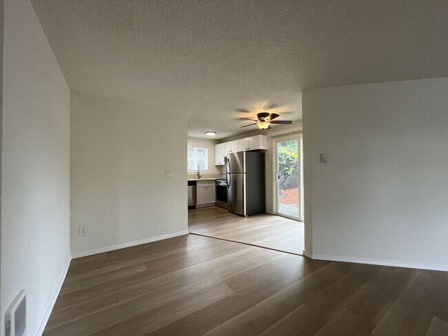 Building Photo - Inviting 2 Bedroom Home with Open Layout, Stainless Steel Appliances & Private Outdoor Retreat