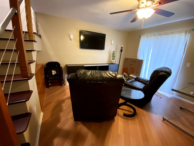 Living room area. TV Is included with rental. Furniture here is not included. - 14448 Reuter Strasse Cir