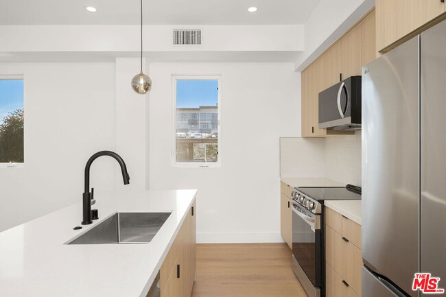 Building Photo - 6239 Banner Ave