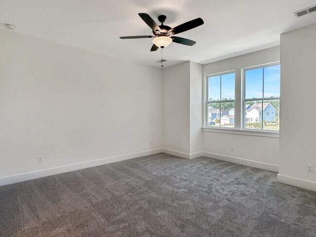 Building Photo - Beautiful, 3-Bedroom Midtown Nexton Townhome with Garage & Amenities