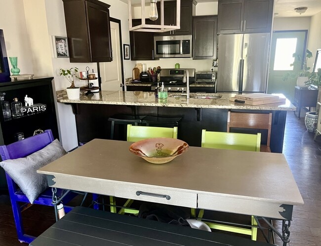 Dining and kitchen - 718 Violet Ln
