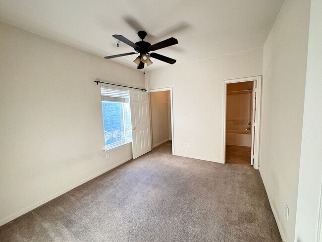 Building Photo - Home Near UNR: Spacious 4BR/4BA with Gated Access and Balcony!