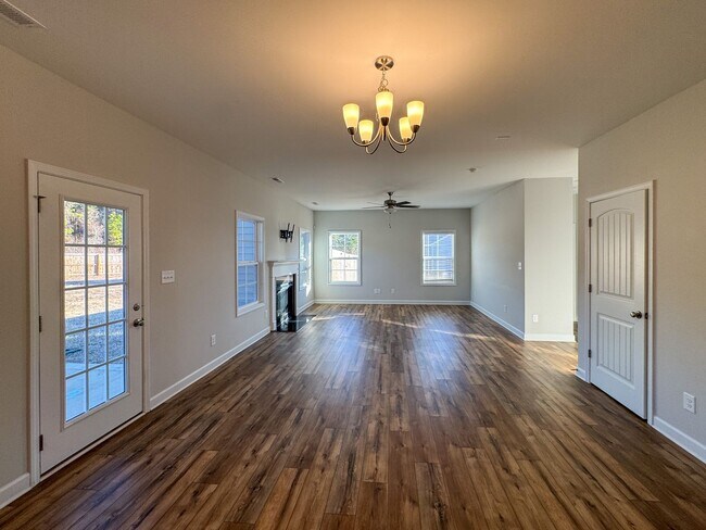 Building Photo - Stunning 4 Bed Home with Fenced Backyard