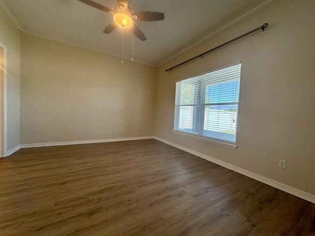 Building Photo - Beautiful 3/2 home near Lake Nona ~ Fenced In Yard ~ LVP & Tile Flooring ~ Community Pool!
