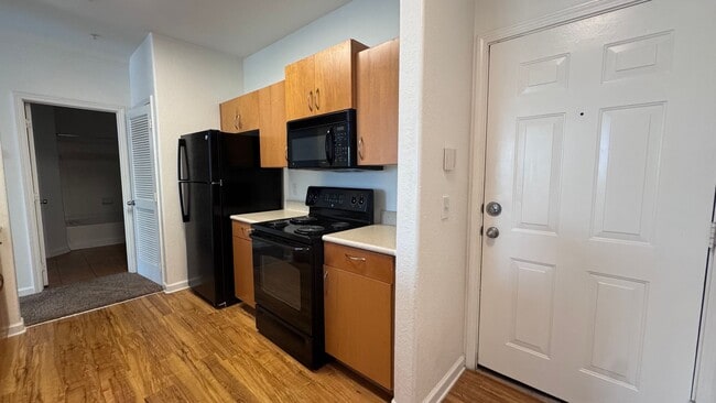 Building Photo - Gated Community Condo Now Available! LOW C...