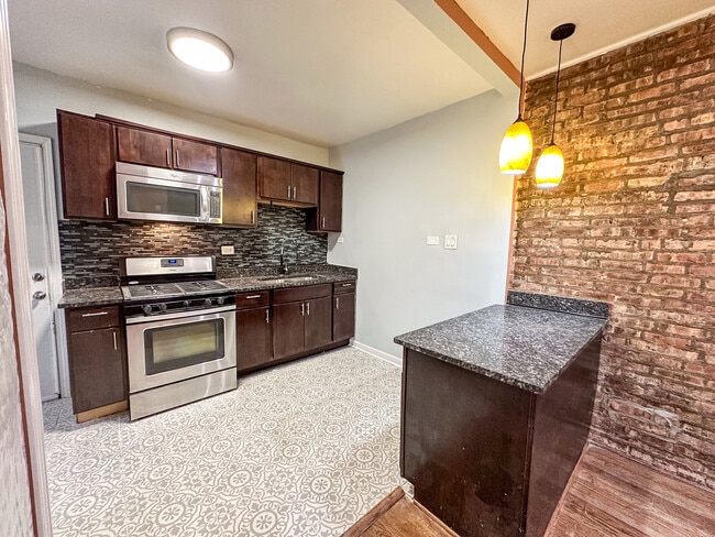 Building Photo - 7926 S Luella Ave