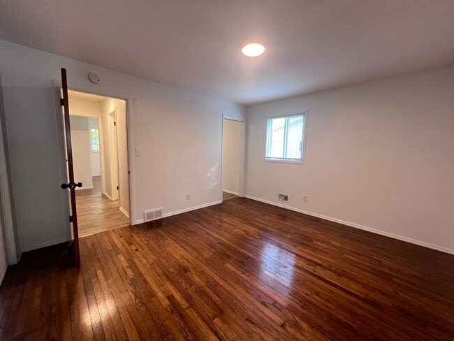 Building Photo - Two Bedroom Duplex SE Side w/ Decorative Fireplace! One Stall in Garage!