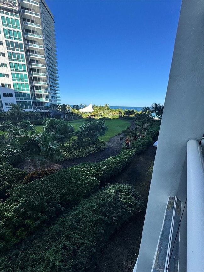 Building Photo - 10275 Collins Ave