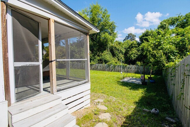 Building Photo - Adorable 3BR Rosewood Rental with Dreamy Porch & Fenced Yard!