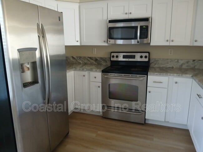 Building Photo - 8550 Tidewater Dr
