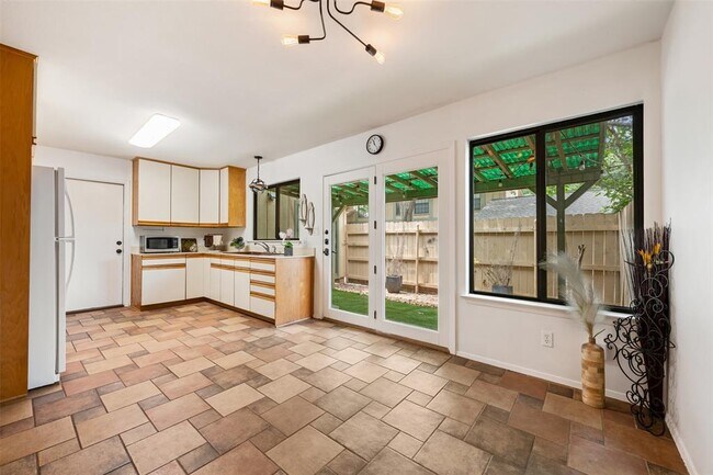 Building Photo - 9504 Quail Village Ln