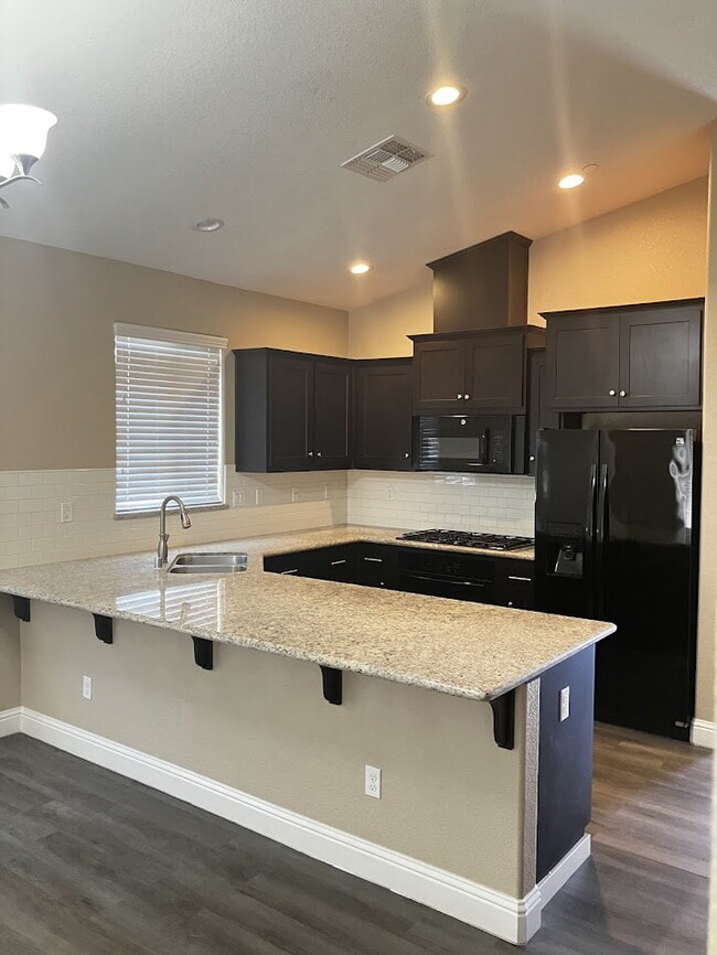 Building Photo - Spacious 4-Bedroom, 2-Bath Rental Home – M...
