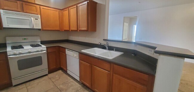 Building Photo - Stunning Condo with Attached Garage