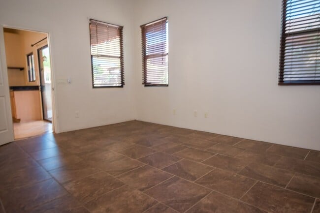 Building Photo - Gorgeous 3 Bedroom 2 Bathroom Home with Tile Throughout! Central A/C, 2 Car Garage!