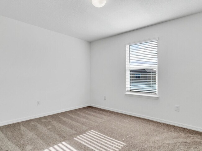 Building Photo - Stunning 4-Bedroom Home with Pond Views in...